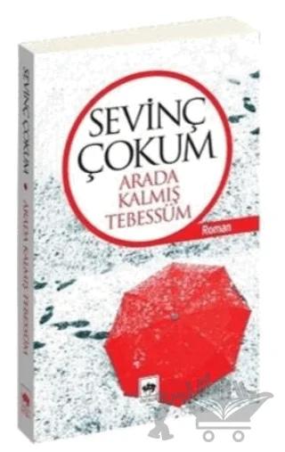 Arada Kalmış Tebessüm